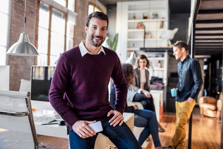 man-purple-jumper-smiling