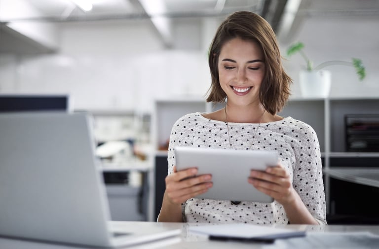 woman-looking-down-at-tablet