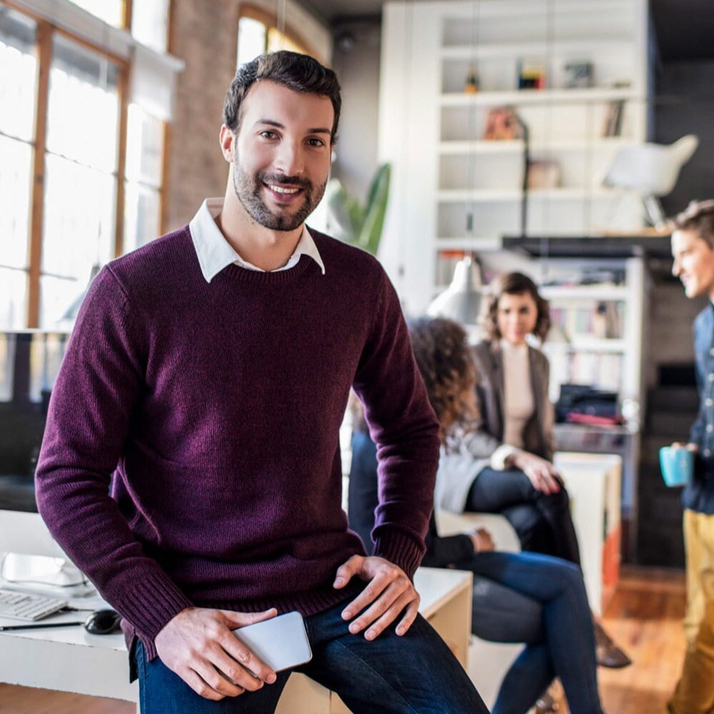 man-purple-jumper-smiling